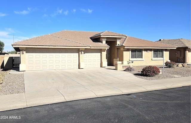 view of front of property with a garage