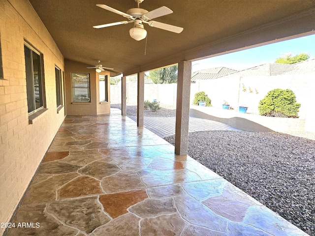 view of patio / terrace featuring ceiling fan