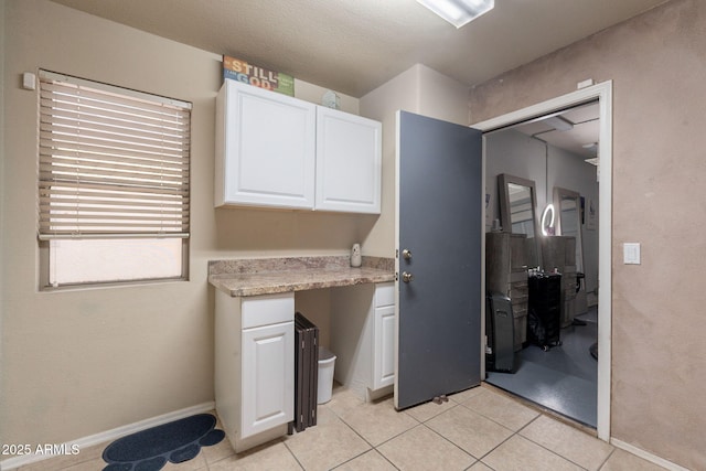 11526 W Bermuda Dr, Avondale, AZ 85392 - laundry room with light tile patterned flooring