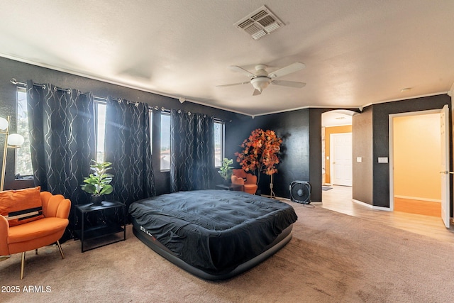 11526 W Bermuda Dr, Avondale, AZ 85392 - carpeted bedroom featuring arched walkways and ceiling fan