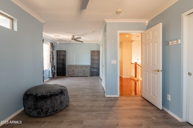 11526 W Bermuda Dr, Avondale, AZ 85392 - corridor with crown molding, wood finished floors, and baseboards