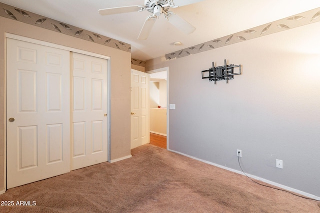 11526 W Bermuda Dr, Avondale, AZ 85392 - unfurnished bedroom with carpet floors, a closet, baseboards, and a ceiling fan