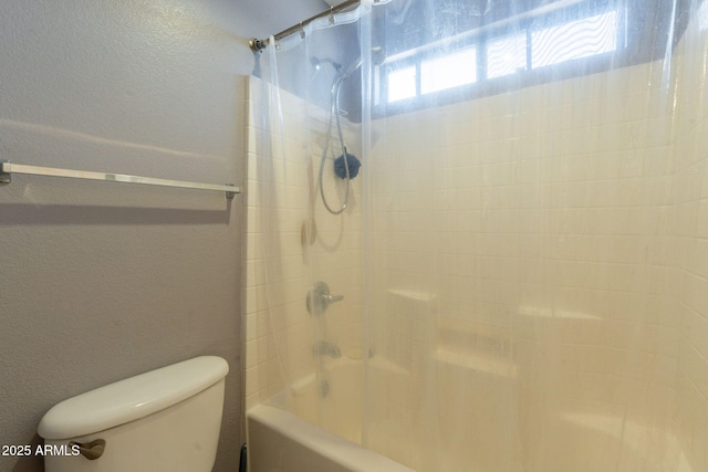 11526 W Bermuda Dr, Avondale, AZ 85392 - full bath with shower / bathtub combination, toilet, and a textured wall