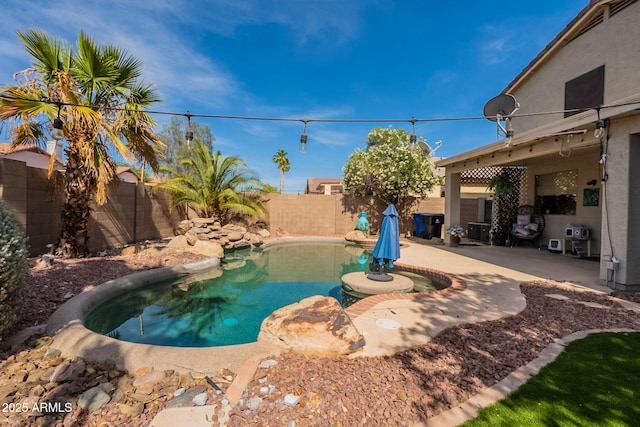 11526 W Bermuda Dr, Avondale, AZ 85392 - view of pool with a fenced backyard and a patio area