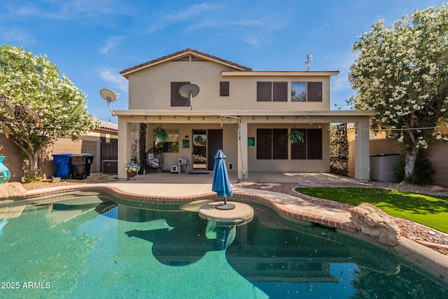 11526 W Bermuda Dr, Avondale, AZ 85392 - back of property featuring a patio area, stucco siding, and a fenced backyard