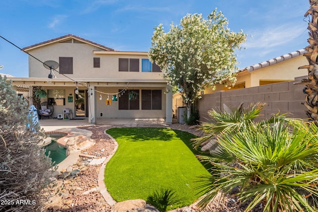 11526 W Bermuda Dr, Avondale, AZ 85392 - rear view of property with stucco siding and a patio area