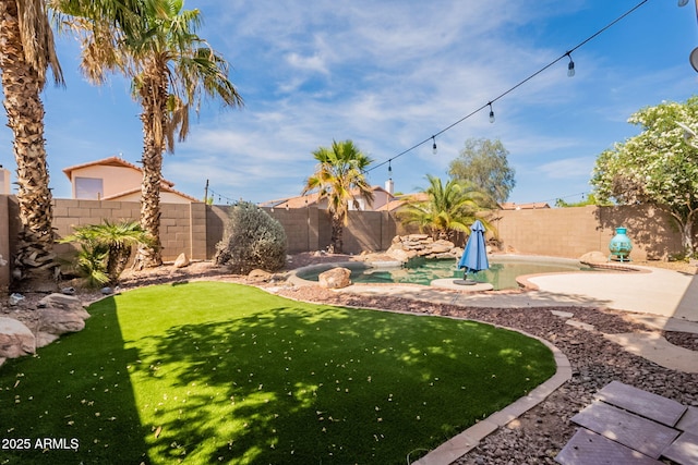 11526 W Bermuda Dr, Avondale, AZ 85392 - view of yard with a patio area