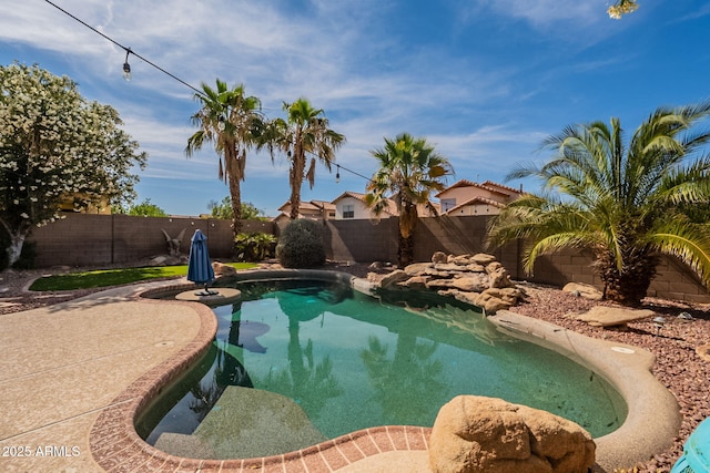 11526 W Bermuda Dr, Avondale, AZ 85392 - view of pool featuring a fenced backyard and a patio