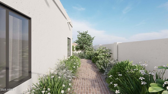 view of side of property featuring stucco siding