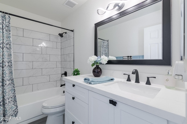 full bathroom featuring toilet, shower / bath combination with curtain, and vanity