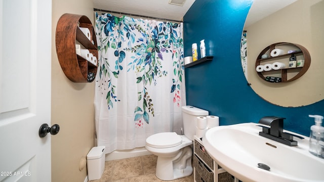 7274 W State Ave, Glendale, AZ 85303 - full bath with a shower with shower curtain and tile patterned flooring