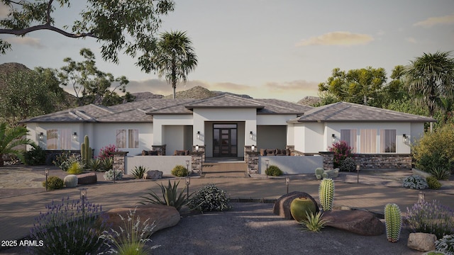13947 E Barwick Dr, Scottsdale, AZ 85262 - view of front facade with stucco siding, stone siding, and a fenced front yard