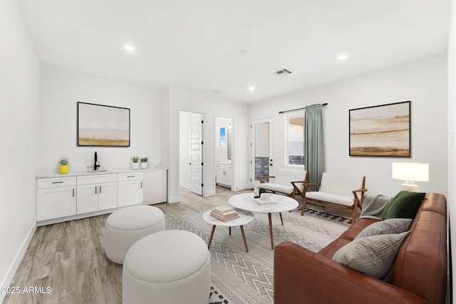 13947 E Barwick Dr, Scottsdale, AZ 85262 - living area featuring recessed lighting, baseboards, light wood finished floors, and visible vents