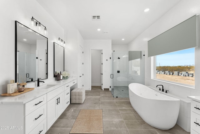 13947 E Barwick Dr, Scottsdale, AZ 85262 - bathroom with a shower stall, a freestanding bath, and vanity