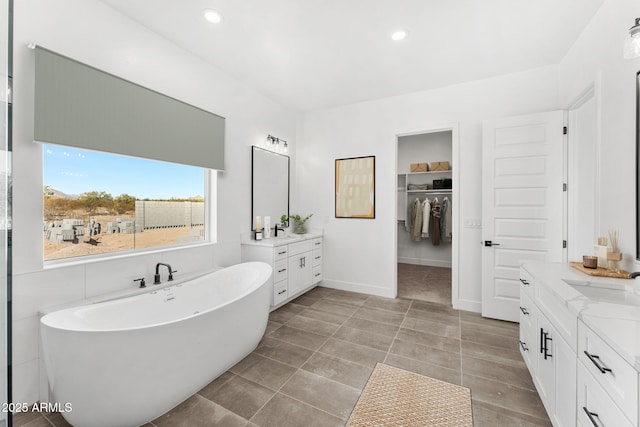 13947 E Barwick Dr, Scottsdale, AZ 85262 - full bath featuring a soaking tub, a sink, two vanities, and recessed lighting