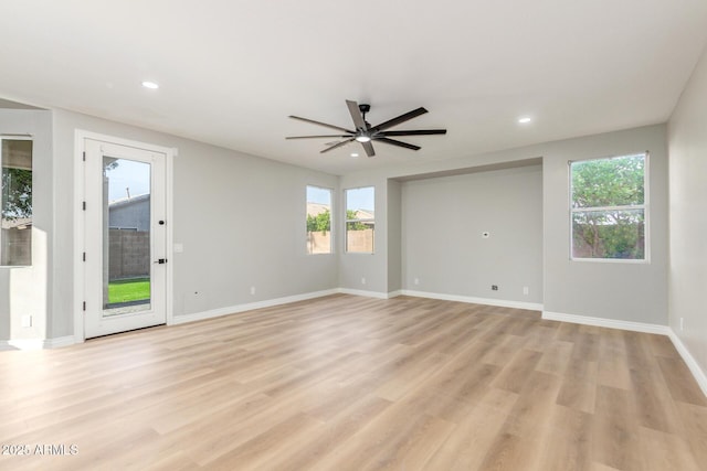 empty room featuring plenty of natural light, recessed lighting, and ceiling fan