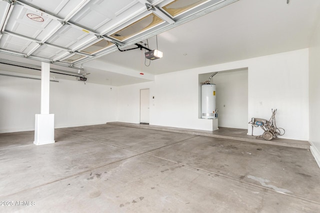 garage with a garage door opener and water heater