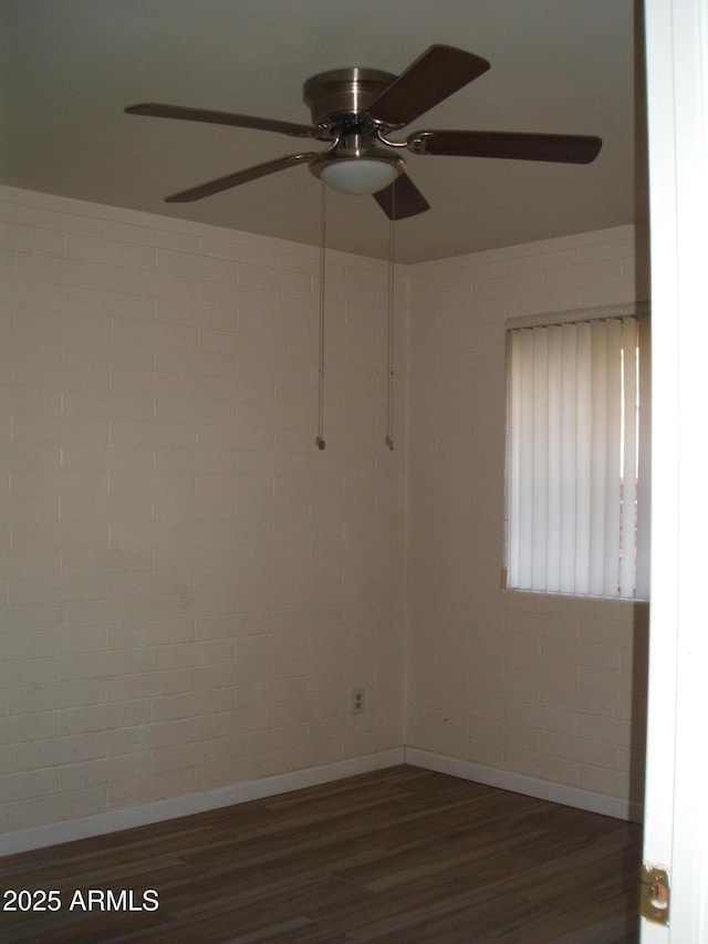 unfurnished room featuring dark hardwood / wood-style floors