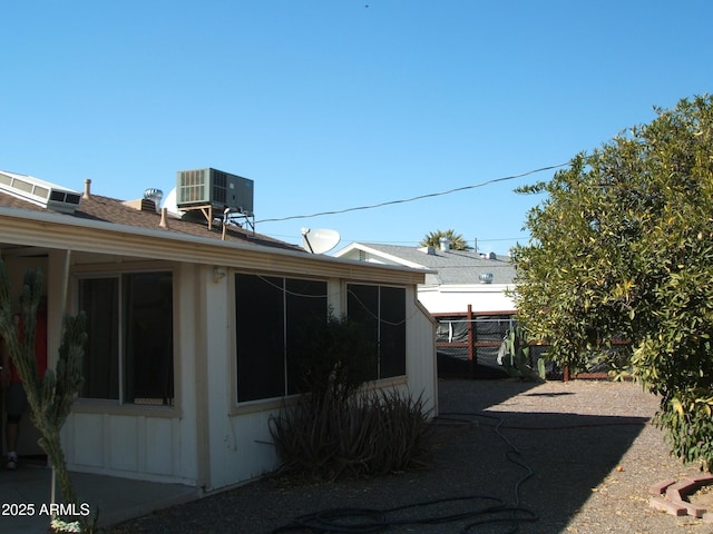 exterior space with central air condition unit