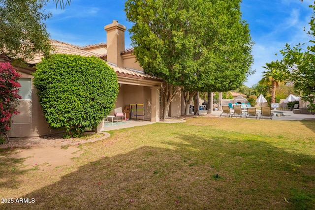view of yard featuring a patio area