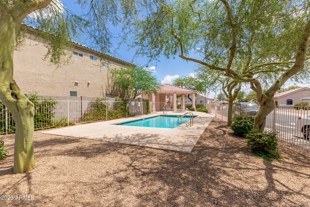 view of swimming pool featuring a patio