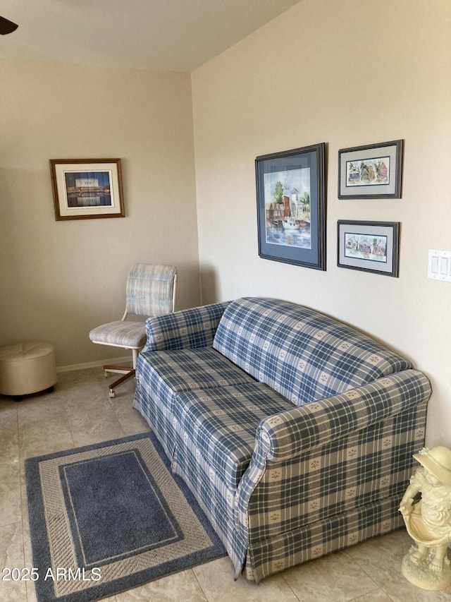 living area with light tile patterned floors