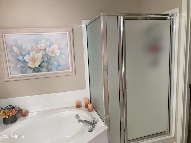 bathroom featuring plus walk in shower