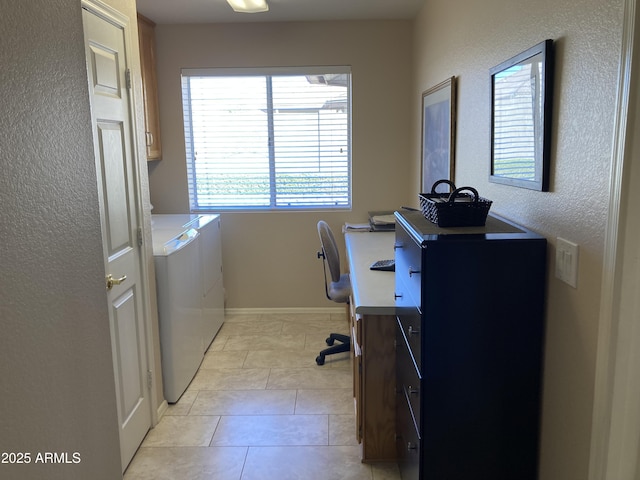 tiled home office with washing machine and clothes dryer