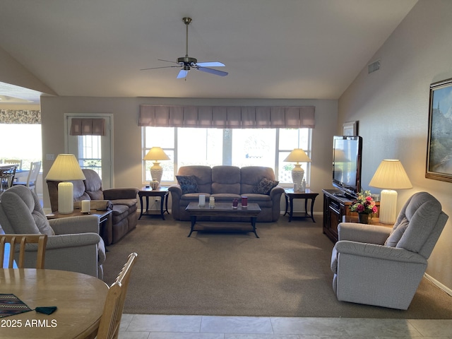 carpeted living room featuring vaulted ceiling and ceiling fan