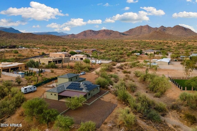 birds eye view of property featuring a mountain view