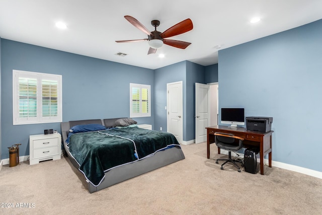 carpeted bedroom featuring ceiling fan