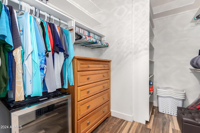 walk in closet featuring beverage cooler