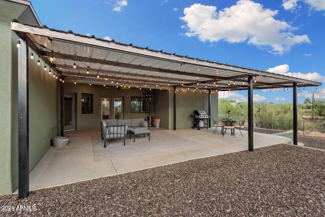 view of patio / terrace with an outdoor living space and grilling area