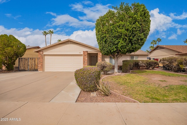 single story home with driveway, brick siding, a front lawn, and an attached garage