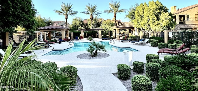 view of pool featuring a gazebo and a patio