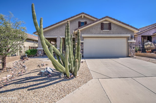 view of front of home with a garage