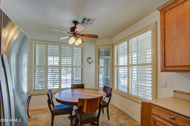 dining room featuring ceiling fan