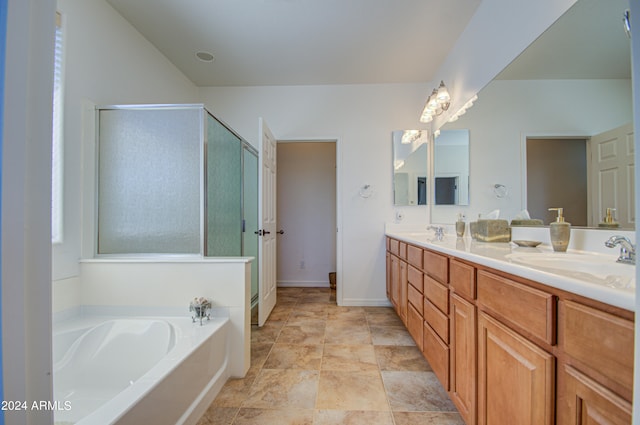 bathroom with vanity and plus walk in shower