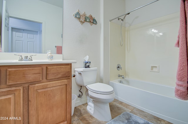 full bathroom with washtub / shower combination, toilet, and vanity