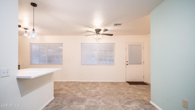 empty room with ceiling fan