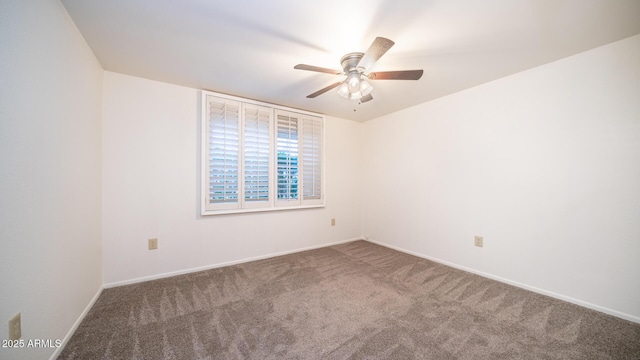 unfurnished room featuring carpet floors and ceiling fan