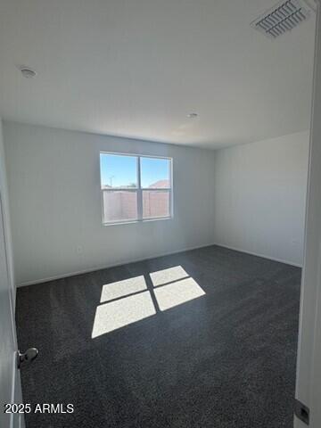 1336 W Hess Ave, Coolidge, AZ 85128 - empty room featuring carpet and a smoke detector