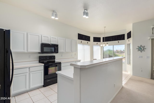 11553 W Sonoran Ct, Surprise, AZ 85378 - kitchen with black appliances, white cabinets, hanging light fixtures, light tile patterned floors, and a notable chandelier