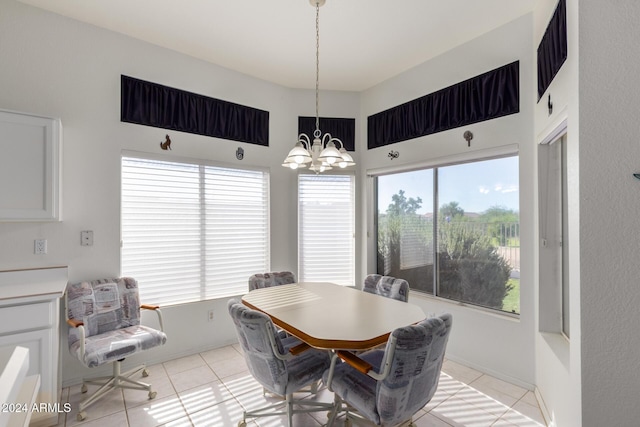 11553 W Sonoran Ct, Surprise, AZ 85378 - dining space featuring plenty of natural light, light tile patterned floors, and a chandelier