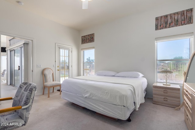 11553 W Sonoran Ct, Surprise, AZ 85378 - bedroom featuring access to exterior, light carpet, and ceiling fan