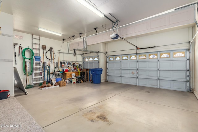 11553 W Sonoran Ct, Surprise, AZ 85378 - garage featuring a garage door opener