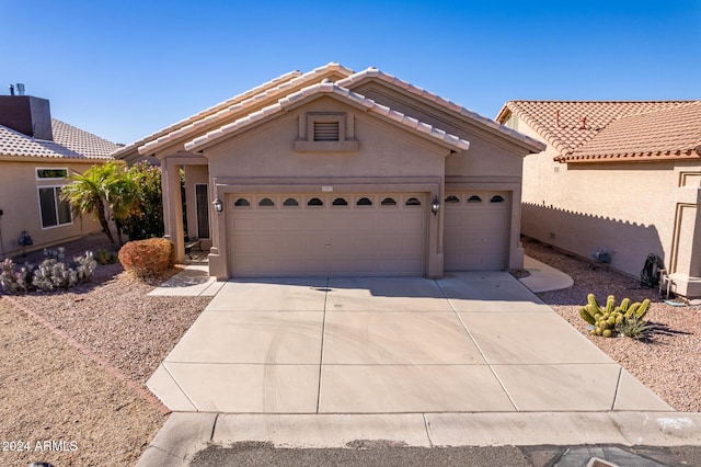 11553 W Sonoran Ct, Surprise, AZ 85378 - view of front of property featuring a garage