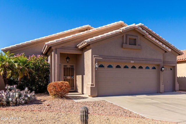 11553 W Sonoran Ct, Surprise, AZ 85378 - view of front facade with a garage