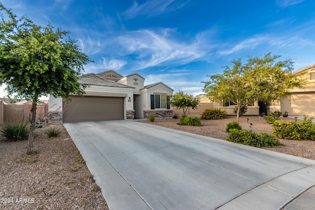 view of front of property featuring a garage