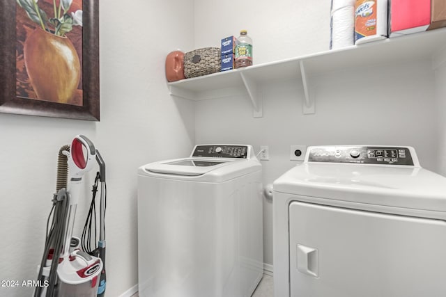 laundry area with washer and dryer